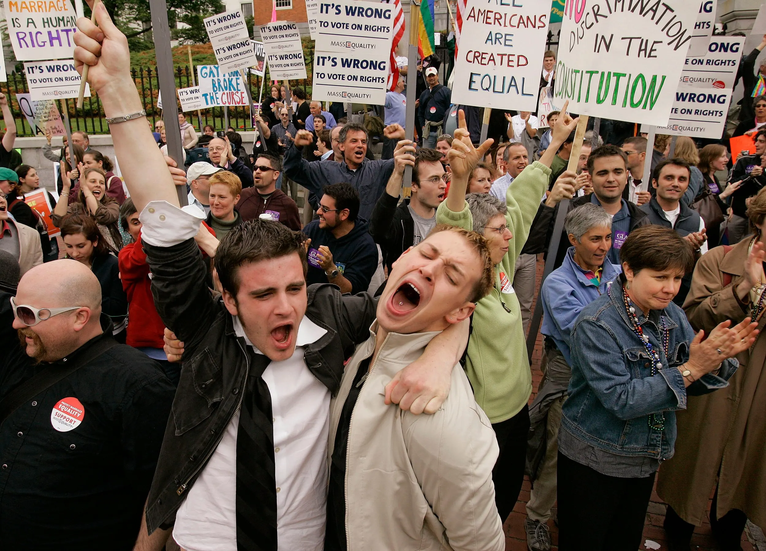 Upcoming Nuptials — Greg Kimball, left, and his partner of five months, Brian O'Connor, celebrate after Massachusetts lawmakers voted to kill a proposed constitutional amendment to ban gay marriage at the Statehouse in Boston, Massachusetts on Thursday afternoon, June 14, 2007. Kimball said he and O'Connor plan to marry now that the legal issue is settled. Years prior, on May 17, 2004, Massachusetts became the first U.S. state and the sixth jurisdiction in the world to legalize same-sex marriage.  (AP Photo/Stephan Savoia)  © The Associated Press