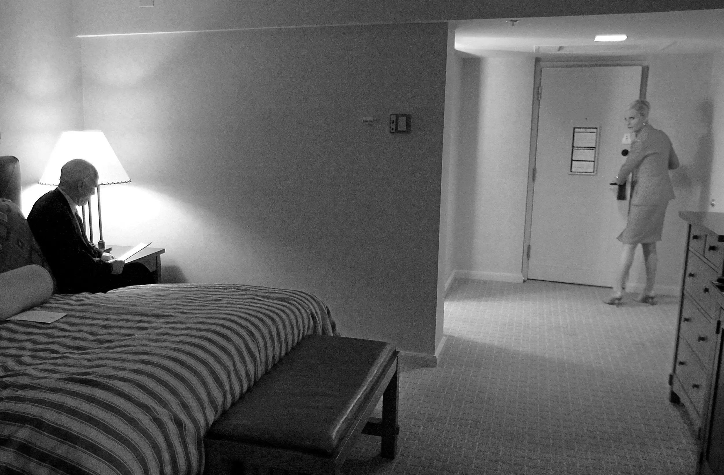 Before The Cheers — Republican presidential hopeful Senator John McCain, Republican Arizona, reads over his Super Tuesday election night speech as his wife, Cindy, closes their hotel room door moments before addressing supporters at his presidential primary election night rally in Phoenix, Arizona, Tuesday night, February 5, 2008. McCain went on to win his party’s nomination then lose in the general election to Democratic nominee Senator Barack Obama.  (AP Photo/Stephan Savoia)  © The Associated Press