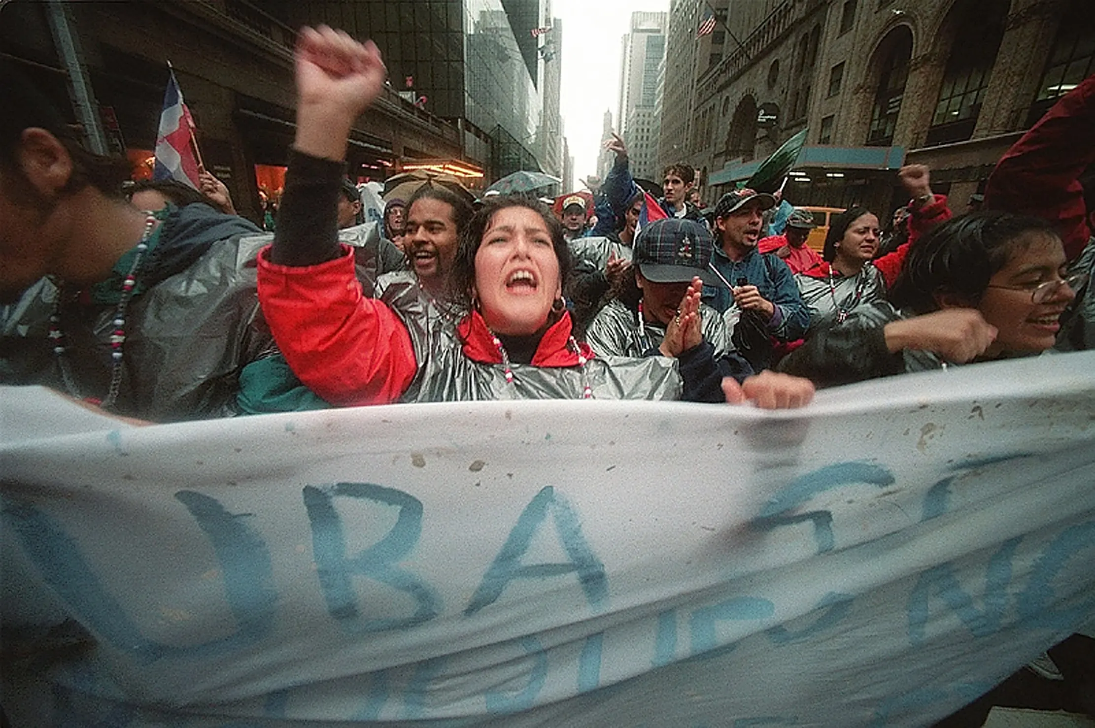 Fidel Friendly — Pro-Castro demonstrators march in New York City on Saturday, October 21, 1995, denouncing the United States embargo on Cuba. This and other demonstrations proceeded the 50th anniversary opening of the United Nations General Assembly.  (AP Photo/Stephan Savoia)  © The Associated Press