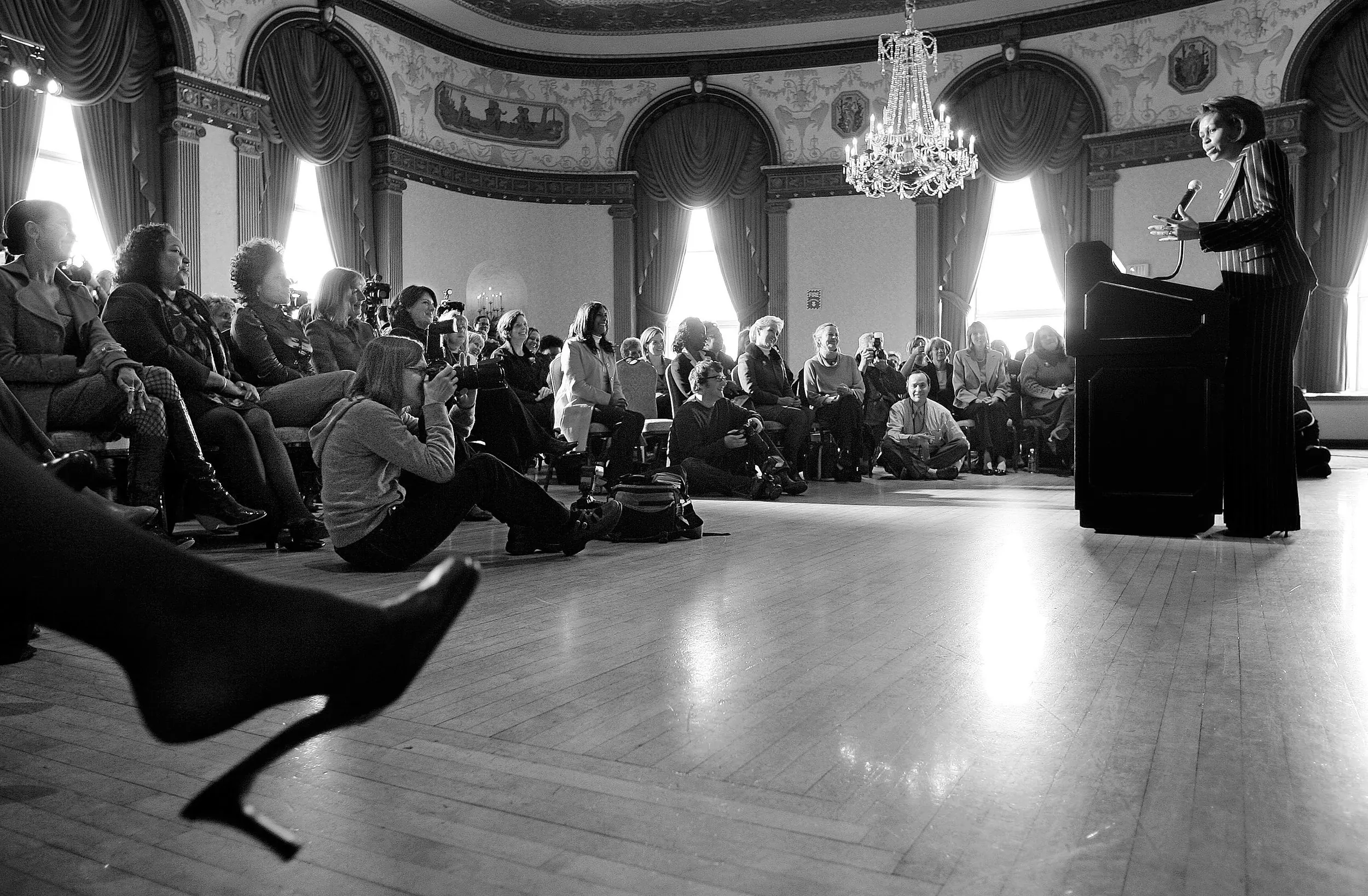 High Heels & Politics — Michelle Obama, wife of Democratic presidential hopeful, Illinois Senator Barack Obama, addresses a Rhode Island Women for Obama gathering while campaigning for her husband in Providence, Rhode Island, on Wednesday afternoon, February 20, 2008.  (AP Photo/Stephan Savoia)  © The Associated Press