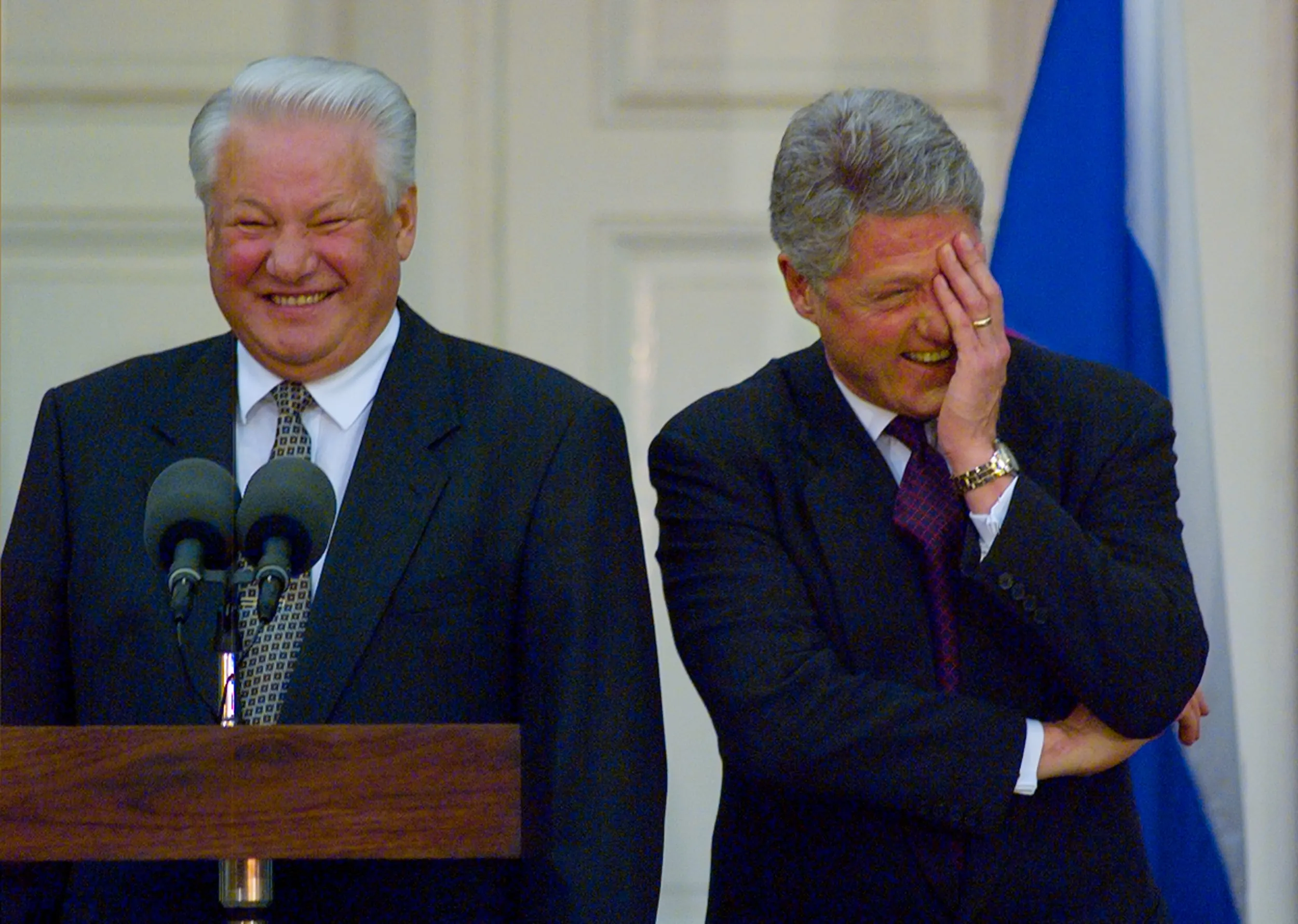 A Critical Critique — U.S. President Bill Clinton and Russian President Boris Yeltsin share a laugh after Yeltsin criticized the minds of journalists during a bilateral meeting news conference in Hyde Park, New York. Former U.S. First Lady Eleanor Roosevelt’s “Val-Kill” cottage is where the two world leaders met Monday afternoon, October 23, 1995 in a sidebar meeting on the third day of the 50th Anniversary meeting of the United Nations General Assembly.  (AP Photo/Stephan Savoia)  © The Associated Press