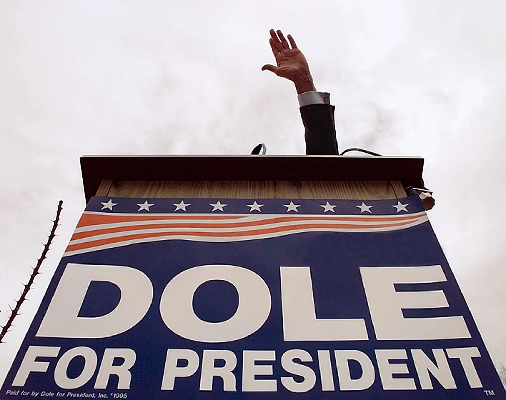 WWII, The Law, Then Politics — Republican Presidential candidate and former U.S. Senate Majority Leader Bob Dole greets supporters as he takes the podium during a campaign stop in the United State’s Southwest early in his 1996 presidential run. Dole, was seriously wounded in action during WW II as his U.S. Army 10th Mountain Division fought Nazi troops in Italy’s Apennine mountains. Dole's injuries required years of recovery and therapy, leaving him with permanent limited use of his right arm. Dole, a resident of Russell Kansas, went on to become a lawyer before running for elected office and a career in politics.  (AP Photo/Stephan Savoia)  © The Associated Press